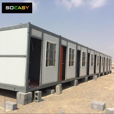 maison de conteneur modulaire avec cabine d'énergie solaire maison préfabriquée de conteneur pliable/petite maison/petite maison pour camp de travail/hôtel/bureau/logement de travailleurs
